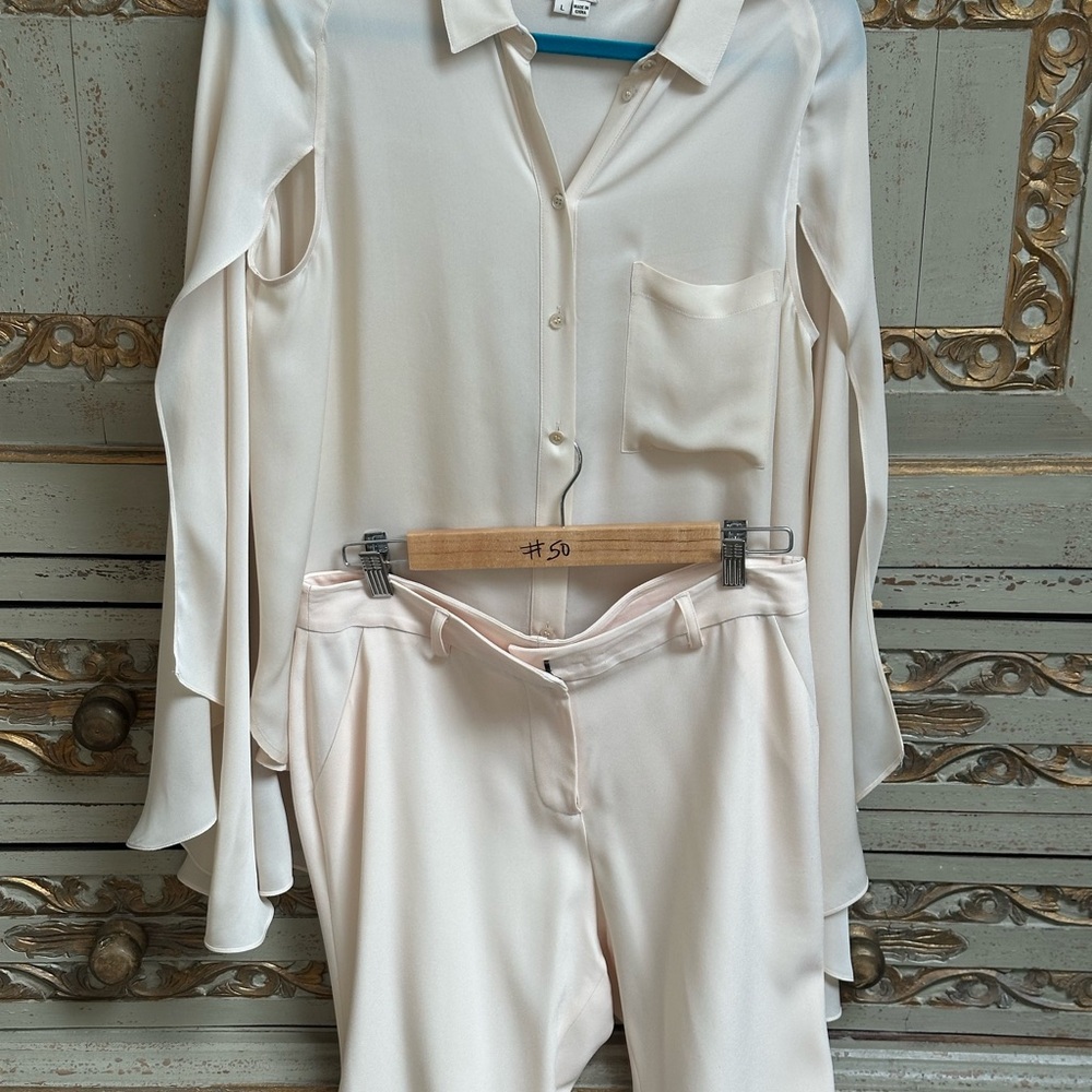 Elegant Cream Women's Pants by haute hippie. Four faux pockets.